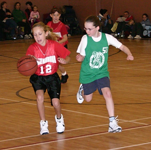 Emily playing basketball